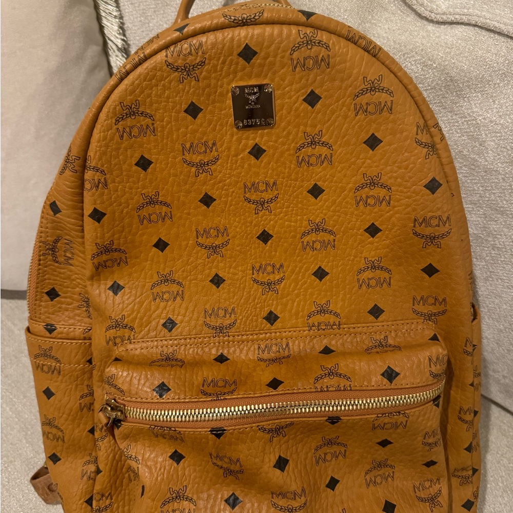 MCM (real) MEDIUM Brown/ Tan backpack with garment back and receipt